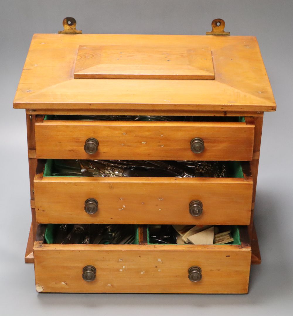 A Community silver plated canteen in three drawer pine chest, 36cm